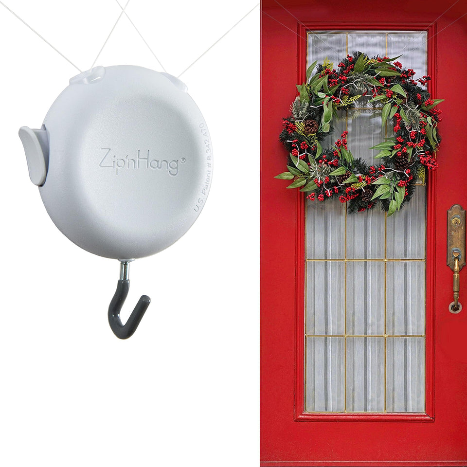 Zip 'n Hang front door wreath hanger demonstrates damage-free hanging on a white door
