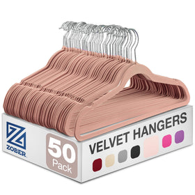 ZOBER blush velvet hangers for 50-pack storage keep garments organized and wrinkle-free.