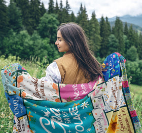 Zolumy blanket on sofa highlights versatile home use and warmth.