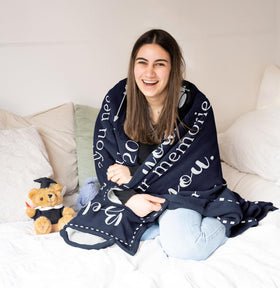 Zolumy graduation blanket features soft-touch fabric for cozy dorm moments.