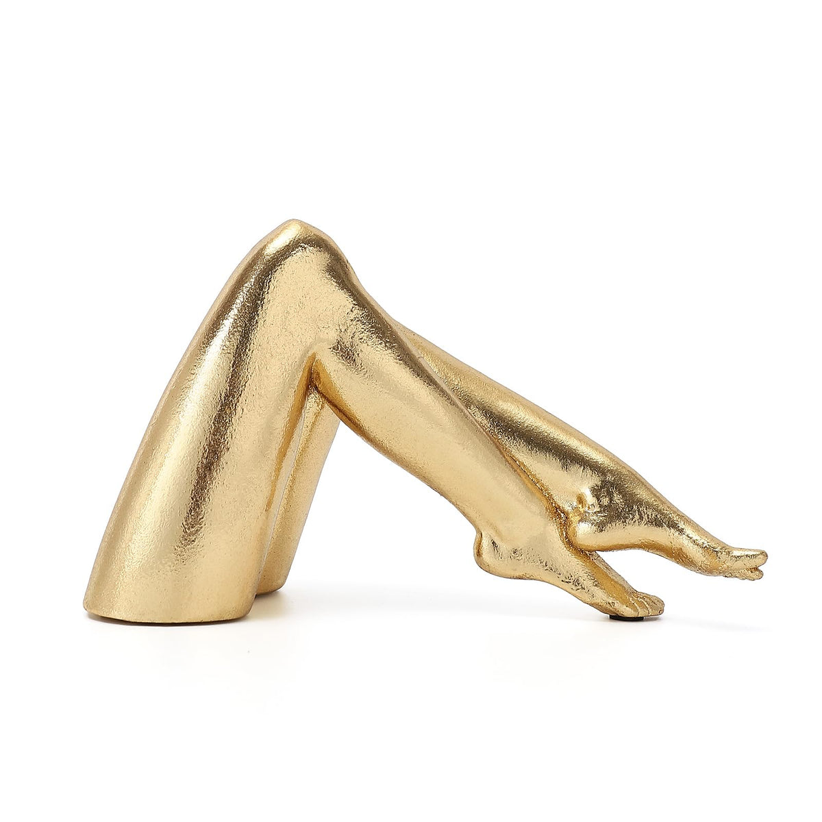Zonsuli Golden Legs bowed-leg sculpture enhances elegant living room decor.