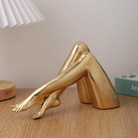 Zonsuli Golden Legs resin-finish sculpture offers porcelain-like look with durable display.