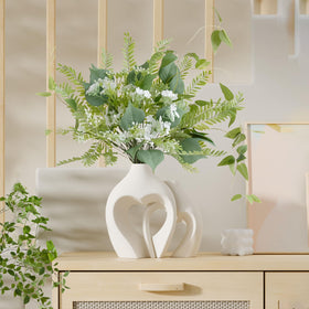 Zormon heart vase pair silhouette—together they evoke a couple embrace.