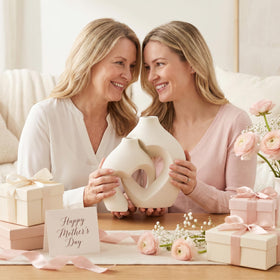 Zormon white heart vase small—pair next to larger for balanced décor.