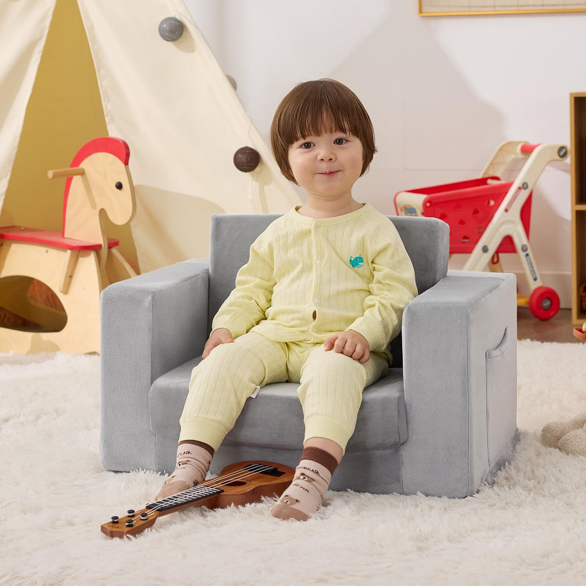 Zorvoxz Kids Couch converts to a recliner, perfect for nap time and lounging.