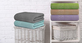 ZUPERIA towels shown in hotel style guest room setting.