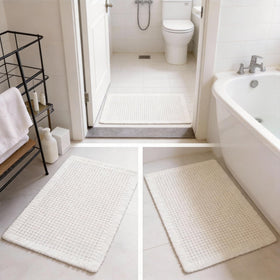 ZVFFDG waffle bath mat with tassels adds textured accent to bathroom decor.