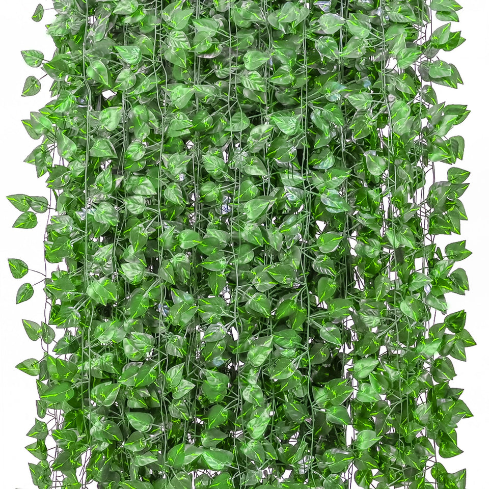ZYIGYI ivy leaves wall garland enhances a bedroom with lush, maintenance-free greenery.